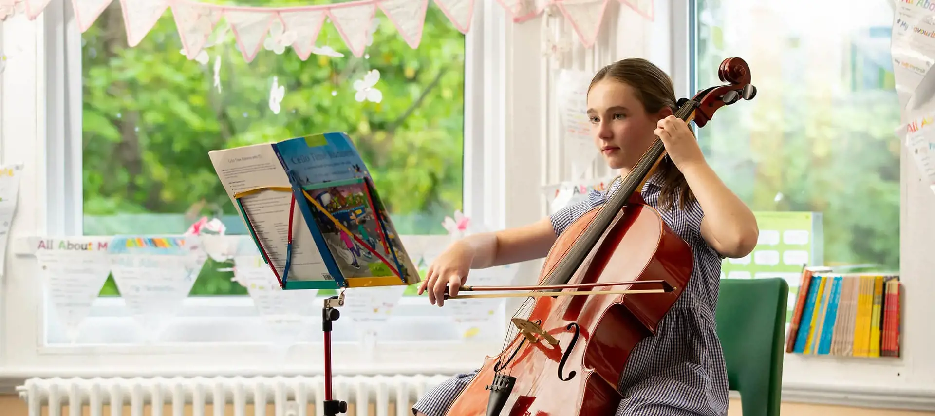 A Prep pupil playing the cello at The Gregg Prep School