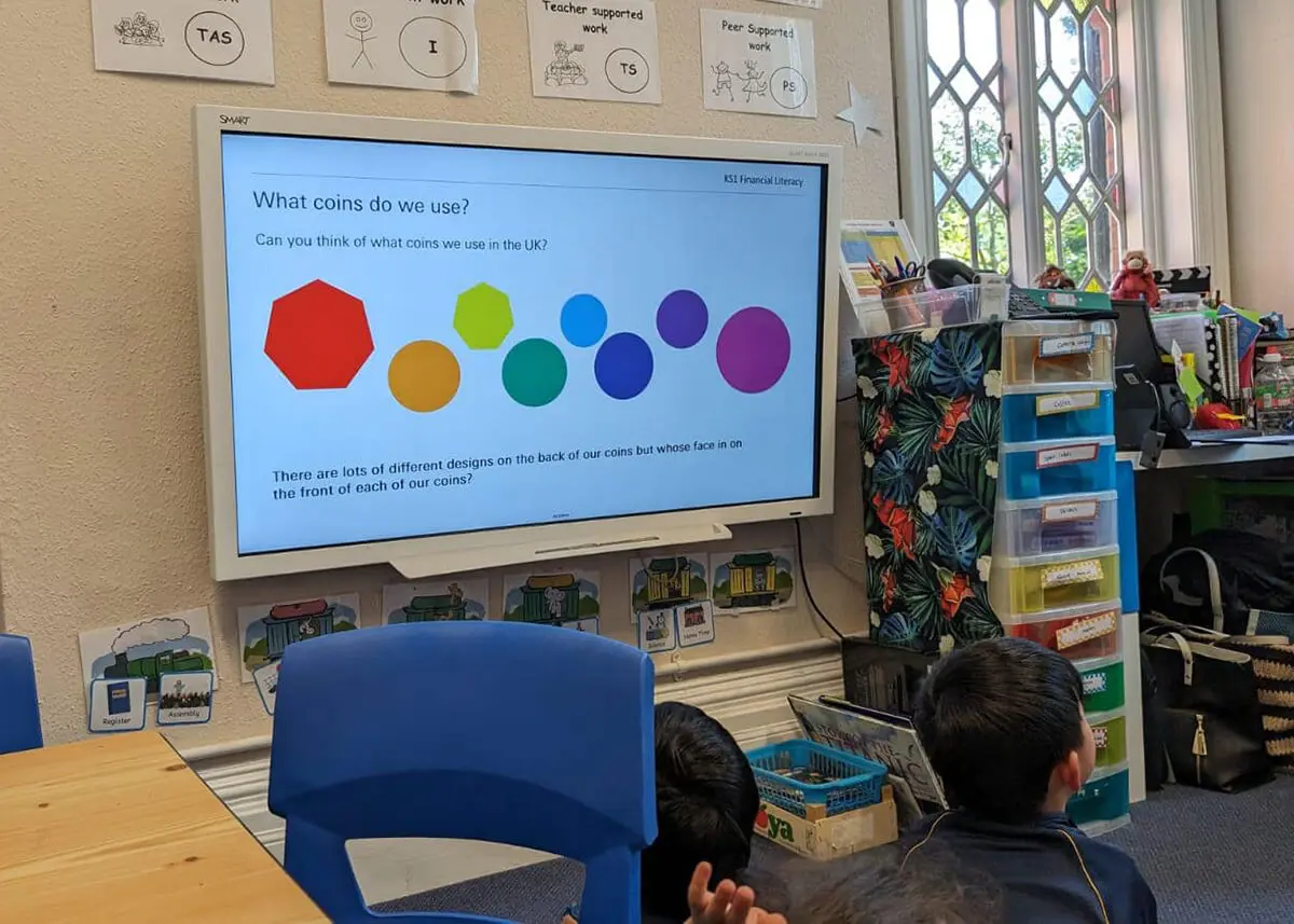 Pupils at The Greg Prep, a private school in Southampton, learning about money