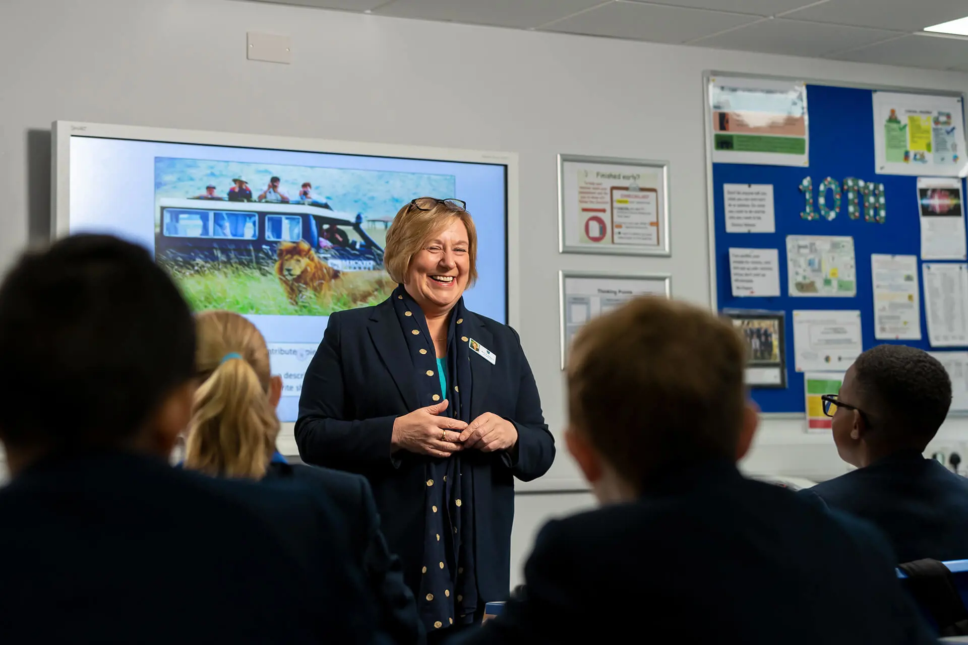 Headteacher working with students at The Gregg School